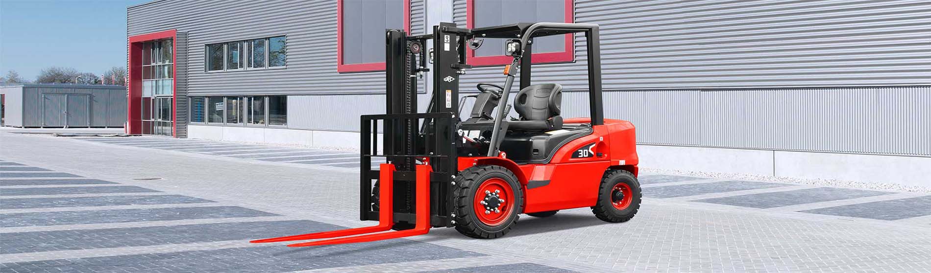 Forklift hire Wimbledon unloading pallets from a commercial truck at goods-in